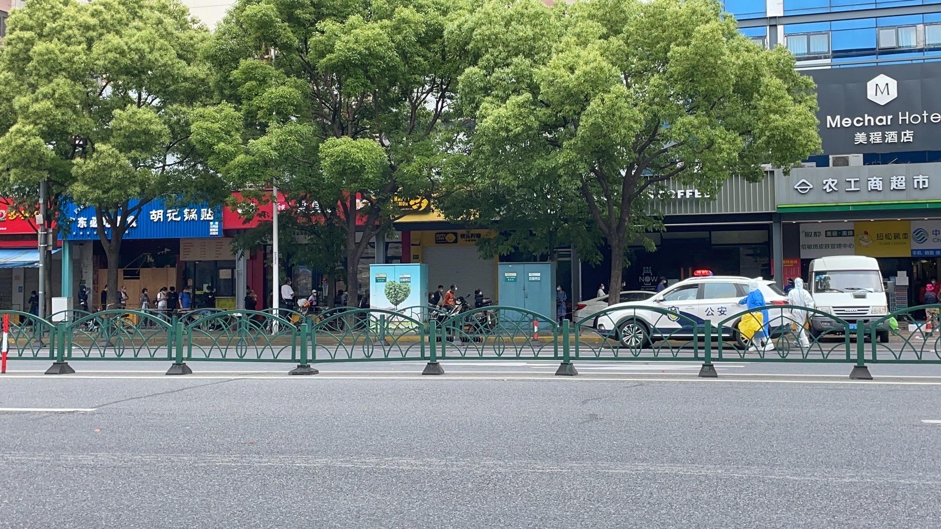 Long queue in front of the supermarket